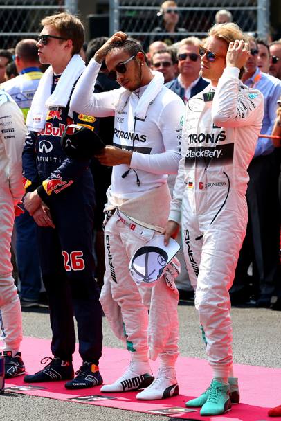 Da sinistra Kvyat, Hamilton e Rosberg. Afp